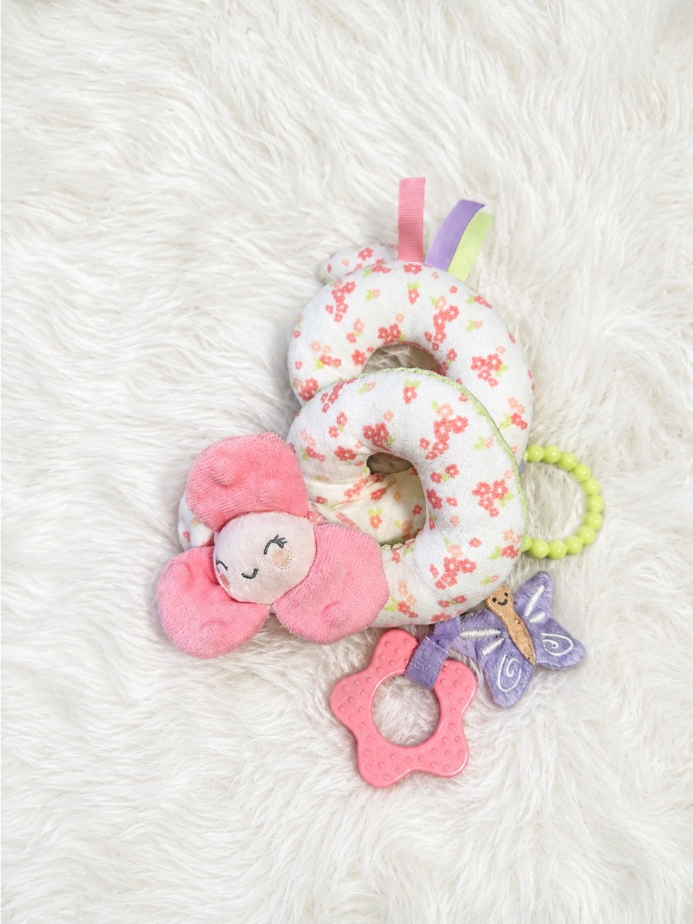 Itzy Ritzy Floral Spiral Activity Toy with Pink Flower and Green Teether